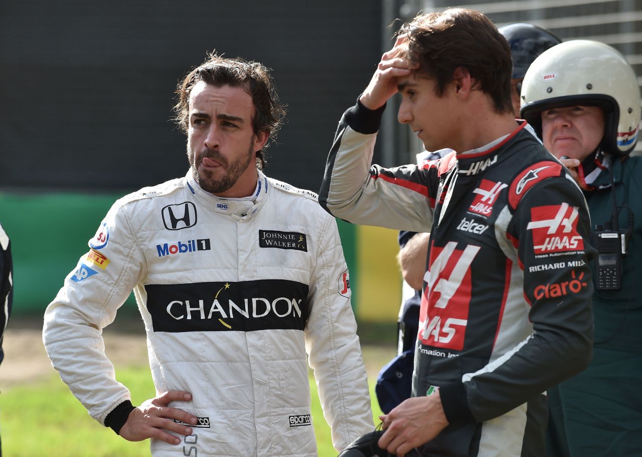 Both Alonso (left) and Gutierrez (right) emerged unscathed, but stunned by the high-speed crash at Melbourne's Albert Park circuit. 