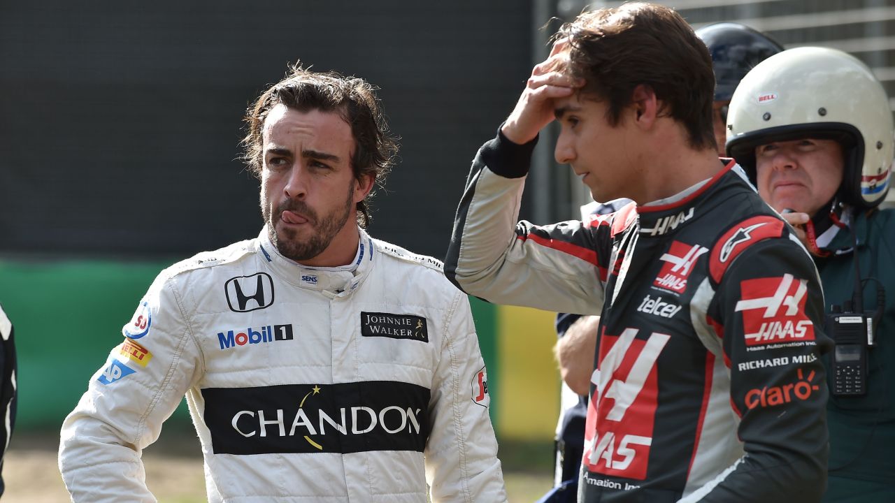 Fernando Alonso (left) and Gutierrez are left stunned by a high-speed crash in Australia.