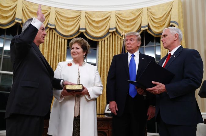 Trump watches as Pence swears in Rex Tillerson as secretary of state on Wednesday, February 1. Tillerson's wife, Renda St. Clair, holds the Bible. Tillerson, a former CEO of ExxonMobil, was <a href="index.php?page=&url=http%3A%2F%2Fwww.cnn.com%2F2017%2F02%2F01%2Fpolitics%2Ftillerson-confirmation-vote-senate%2F" target="_blank">confirmed in the Senate </a>by a vote of 56 to 43.