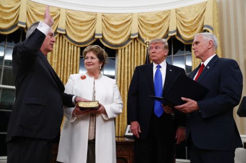 Trump watches as Pence swears in Rex Tillerson as secretary of state on Wednesday, February 1. Tillerson's wife, Renda St. Clair, holds the Bible. Tillerson, a former CEO of ExxonMobil, was <a href="http://www.cnn.com/2017/02/01/politics/tillerson-confirmation-vote-senate/" target="_blank">confirmed in the Senate </a>by a vote of 56 to 43.
