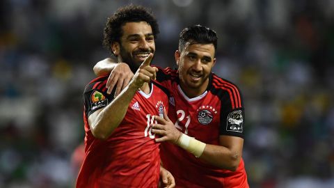 Salah (L) celebrates with Egypt's midfielder Mahmoud Hassan after scoring a goal during the 2017 Africa Cup of Nations.


 