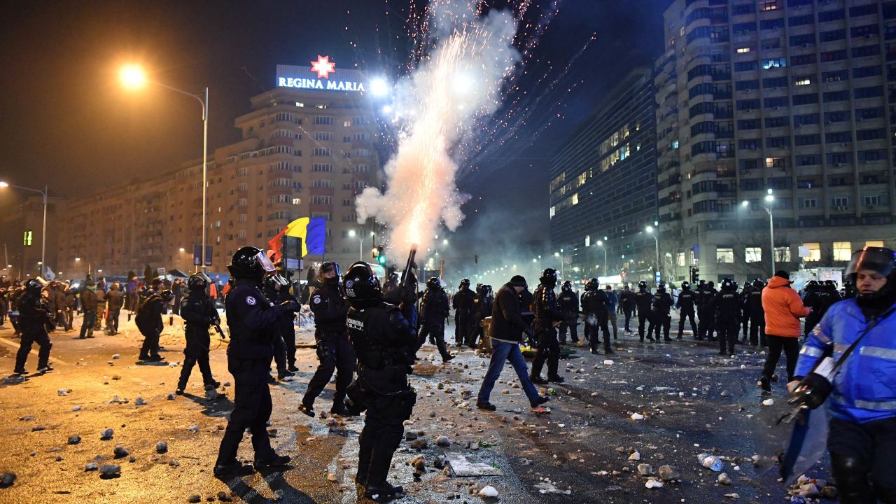 Riot police fire tear gas during protests Wednesday in Bucharest. 