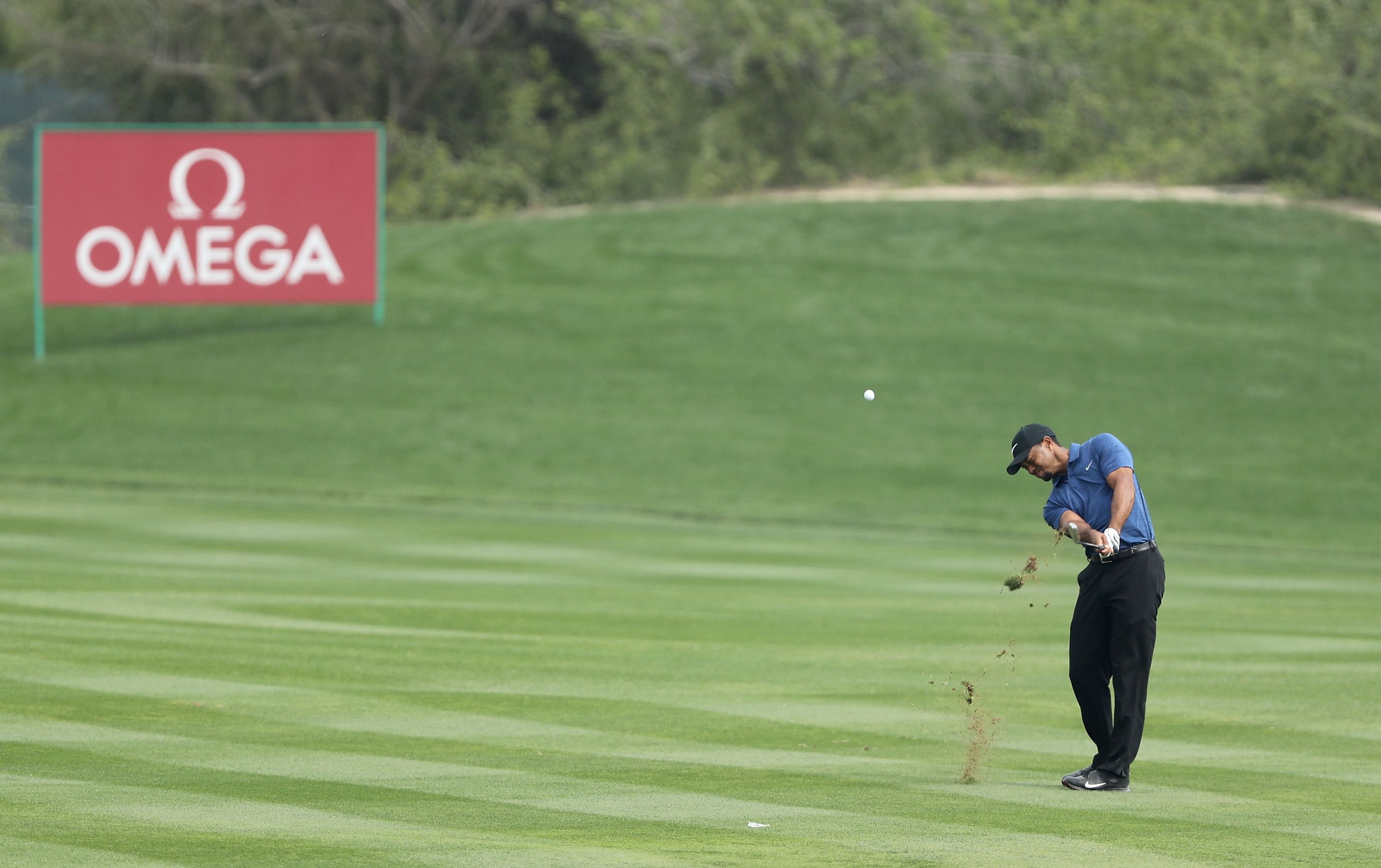"I'm fighting my ass off to try and shoot a score," Woods said, EuropeanTour.com reported. 