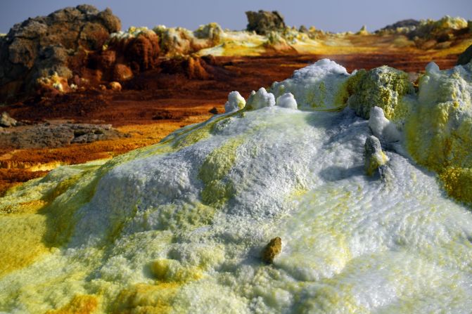 Hot springs in the depression are studied by scientists to see how microorganisms can live in such extreme conditions, which might offer clues about the possibility of life on other planets.  