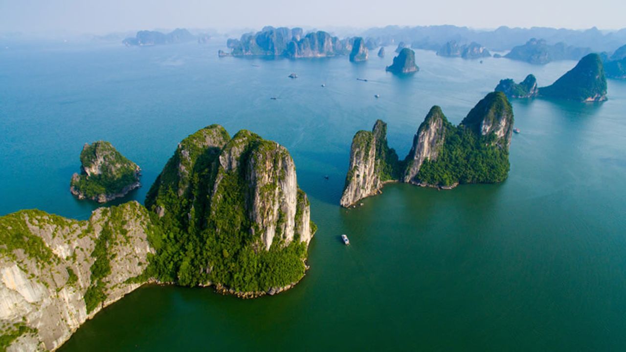 <strong>Halong Bay, Vietnam: </strong>Riding on a traditional Chinese junk ship is the most popular way to explore Halong Bay and its thousands of small islands and standing karsts.