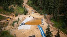 SILVERTON, CO - AUGUST 11: A settling pond is used at Cement Creek, which was flooded with millions of gallons of mining wastewater, on August 11, 2015 in Silverton, Colorado. The Environmental Protection Agency uses settling ponds to reduce the acidity of mining wastewater so that it carries fewer heavy metals. (Photo by Theo Stroomer/Getty Images)