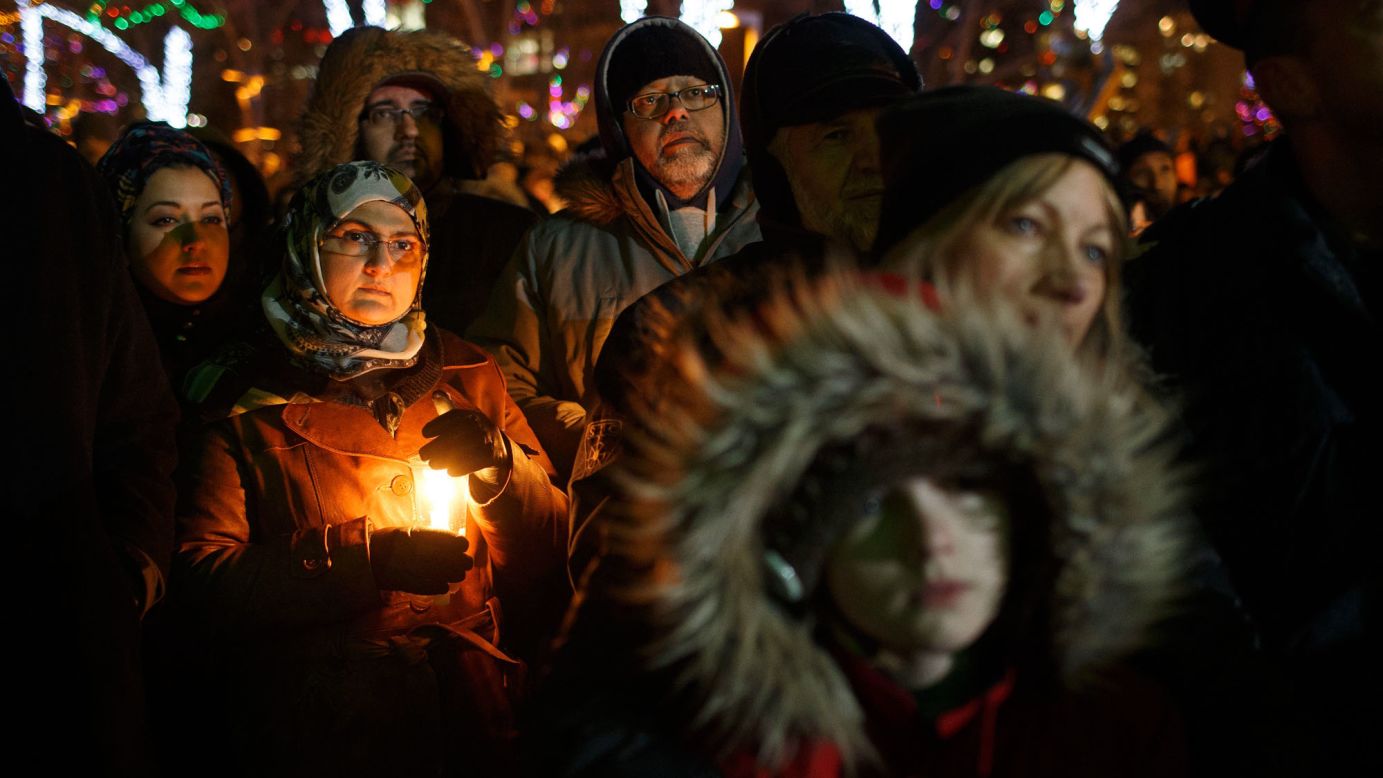 People attend a vigil for victims of a <a href="http://www.cnn.com/2017/01/29/americas/quebec-mosque-shooting/" target="_blank">shooting at a Quebec City mosque</a> in Canada on Monday, January 30. The night before, a gunman fired into dozens of worshippers gathered for evening prayers at the Quebec Islamic Cultural Center, <a href="http://www.cnn.com/2017/01/31/americas/quebec-mosque-shooting-victims/index.html" target="_blank">killing six</a> and injuring eight. <a href="http://www.cnn.com/2017/01/31/americas/quebec-mosque-shooting-suspect/index.html" target="_blank">The 27-year-old suspect</a> in the deadly rampage is French-Canadian and was known to local activists for his far-right and nationalist views, according to news reports. 