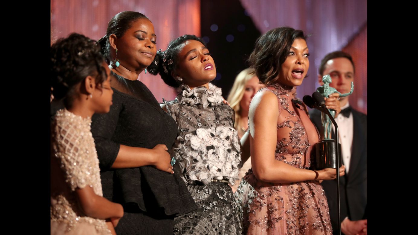 "Hidden Figures" stars Octavia Spencer, second from left, Janelle Monae and Taraji P. Henson accept an award at the SAG Awards in Los Angeles on Sunday, January 29. "Hidden Figures" -- based on the true story of African- American women who played vital roles in NASA's early space missions -- won for outstanding performance by a cast in a motion picture. "This film is about unity," Henson said while accepting the award.