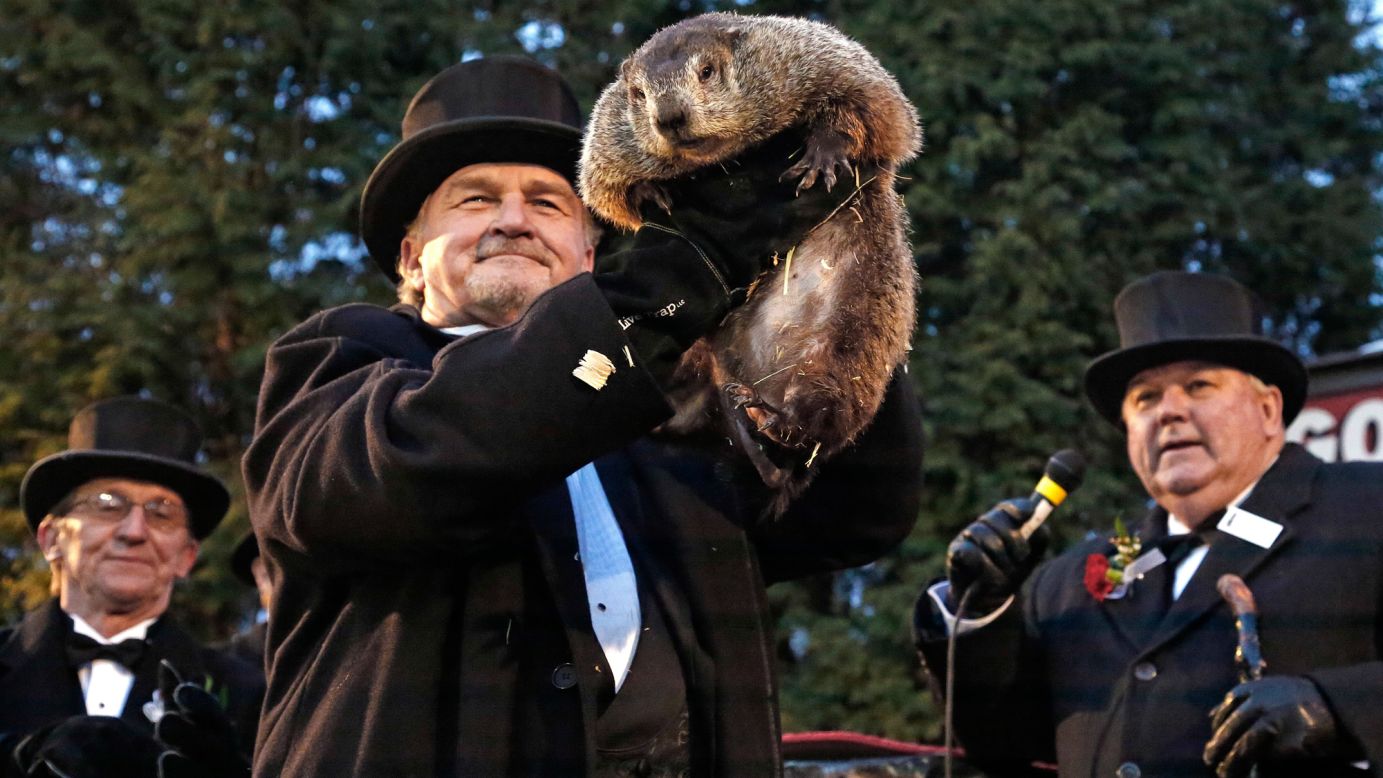 Groundhog Club handler John Griffiths holds Punxsutawney Phil, the weather prognosticating groundhog, during the 131st celebration of Groundhog Day in Punxsutawney, Pennsylvania, on Thursday, February 2. <a href="http://www.cnn.com/2017/02/02/us/groundhog-day-trnd/" target="_blank">Punxsutawney Phil emerged and saw his shadow</a>, which, according to legend, means six more weeks of winter.