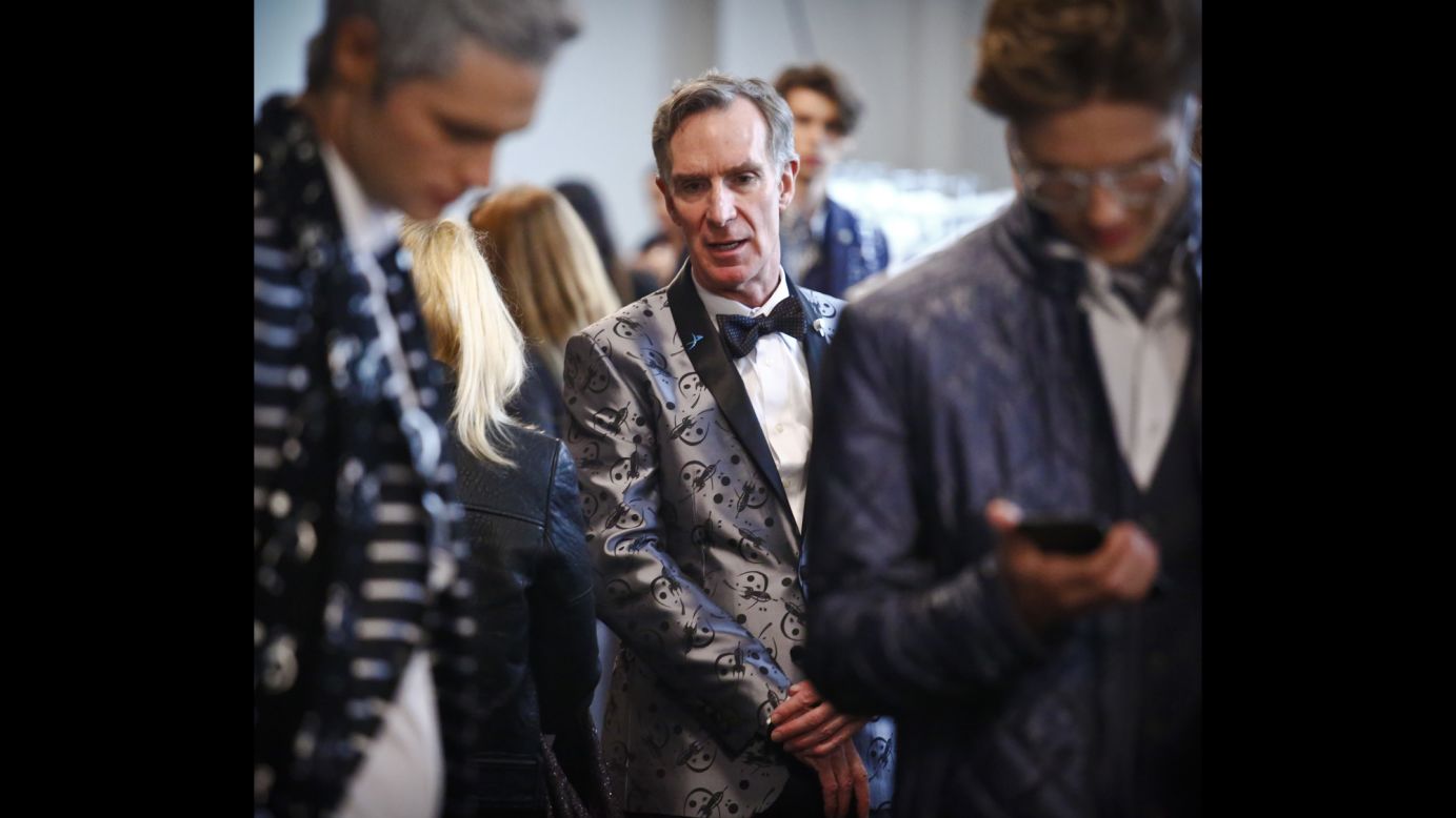 Bill Nye, center, waits backstage before appearing in the Nick Graham Mars-themed fashion show during Men's Fashion Week in New York on Tuesday, January 31. The science educator and engineer is known for his 1990s hit show "Bill Nye the Science Guy."