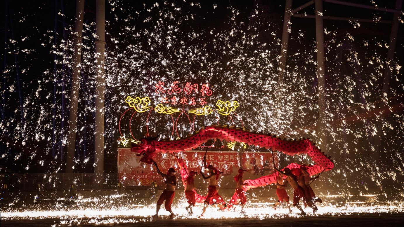 Sparks fly as Chinese dragon dancers perform at a local park on the fifth day of the Lunar New Year in Beijing on Wednesday, February 1. <a href="http://edition.cnn.com/2017/01/25/travel/lunar-new-year-etiquette-dos-donts-chinese-new-year/" target="_blank">Lunar New Year</a> is the biggest holiday of the year for many Chinese, with many making trips home to see their loved ones.