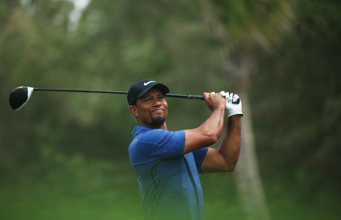 A "back spasm" has forced Tiger Woods to withdraw from the Dubai Desert Classic.  