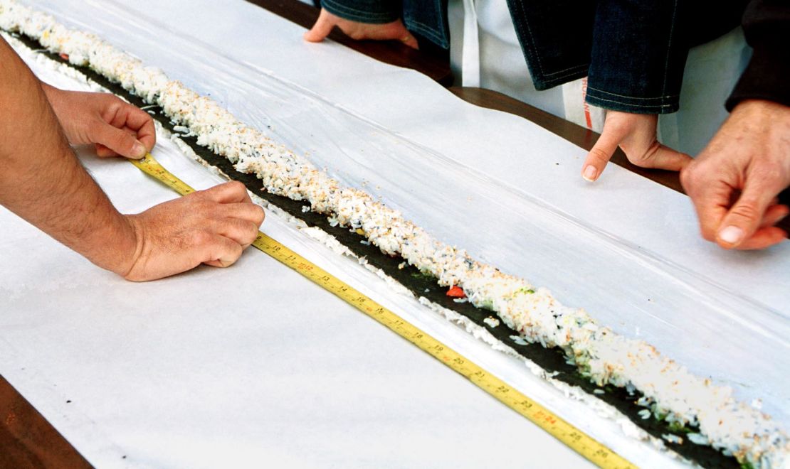 A section of the world's largest California Roll. Whatever the size, this is America's favorite sushi.