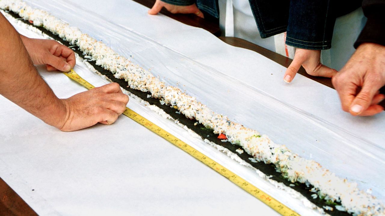 A section of the world's largest California Roll. Whatever the size, this is America's favorite sushi.