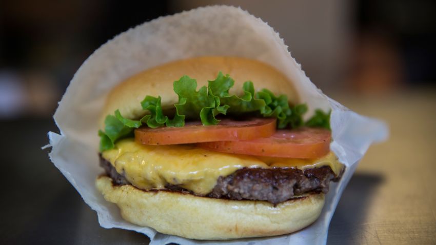 NEW YORK, NY - AUGUST 18: A Shake Shack burger is displayed on August 18, 2014 in Madison Square Park in New York City. Shake Shack is allegedly considering going public and holding an initial price offering (IPO).  (Photo by Andrew Burton/Getty Images)