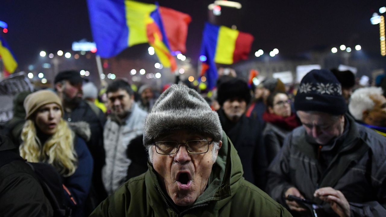 Protesters waved Romanian flags on Thursday in Bucharest.