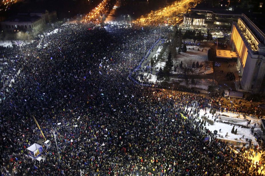 Protesters crowded in front of government headquarters in Bucharest on February 1,  demonstrating against the passage of a law that would decriminalize corruption. 