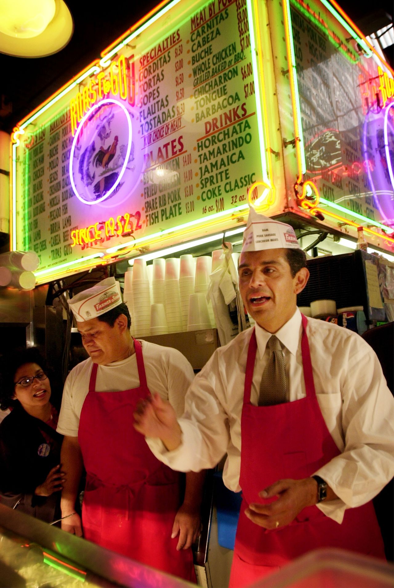 Los Angeles mayoral candidate Antonio Villaraigosa takes orders for tacos in the Grand Central Market on election day, in 2001.