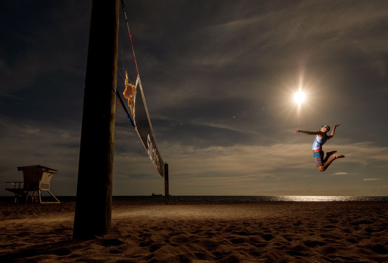 The series of images -- entitled "Spike the Sun" -- were captured by photographer Dustin Snipes. A "spike" is an attacking shot similar to the overhead smash in tennis.