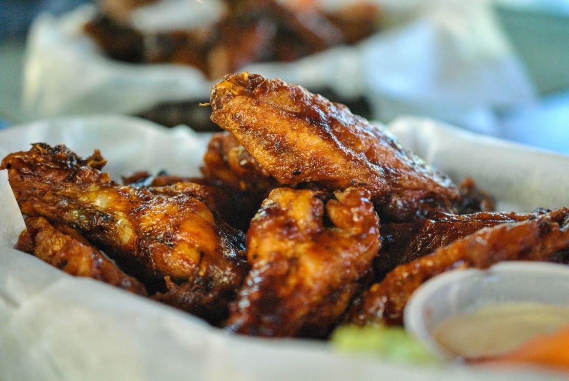 Buffalo wings are coated in cayenne pepper and hot sauce.