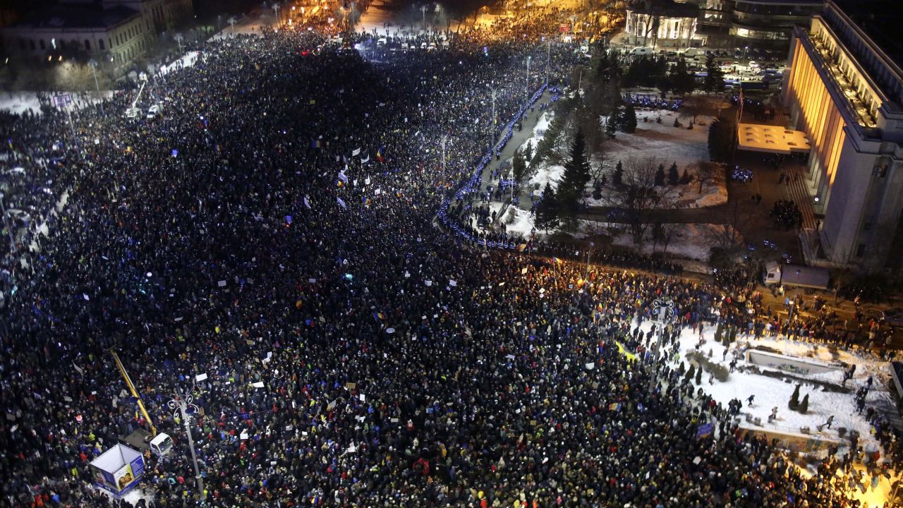 Scores of people demonstrating against corruption reforms in Bucharest on Thursday.