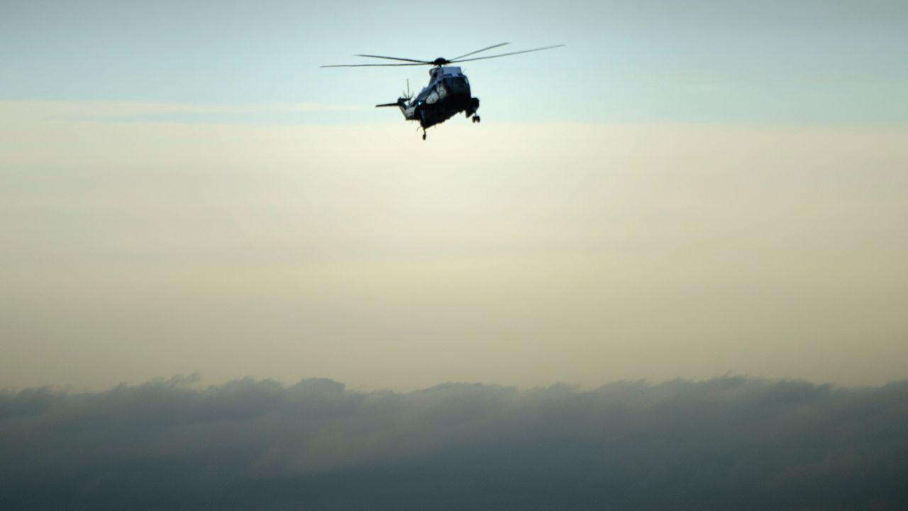 Marine One lands at Dover Air Force Base in Delaware on Wednesday, February 1. Trump <a href="http://www.cnn.com/2017/02/01/politics/donald-trump-dover-afb-william-ryan-owens/" target="_blank">made an unannounced visit</a> for the dignified transfer of Navy SEAL William "Ryan" Owens, who was killed in a raid against al Qaeda, according to US Central Command.