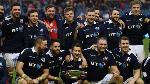 Greig Laidlaw and his Scotland teammates pose with the Centenary Quaich Cup. 