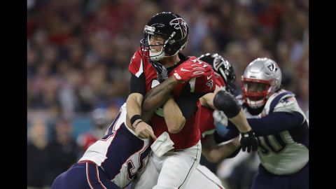 Ryan, <a href="http://edition.cnn.com/2017/02/04/sport/super-bowl-li-atlanta-falcons-matt-ryan/index.html" target="_blank">the league's MVP this season,</a> is hit after a throw early in the game. The game was scoreless at the end of the first quarter.