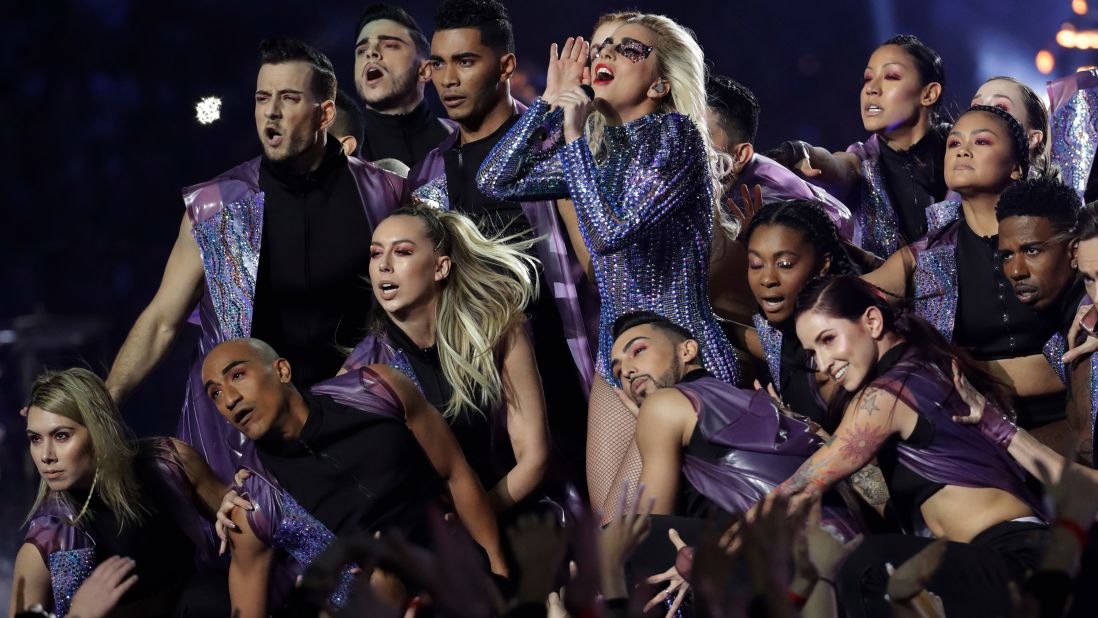 Dancers surround Gaga during the show.
