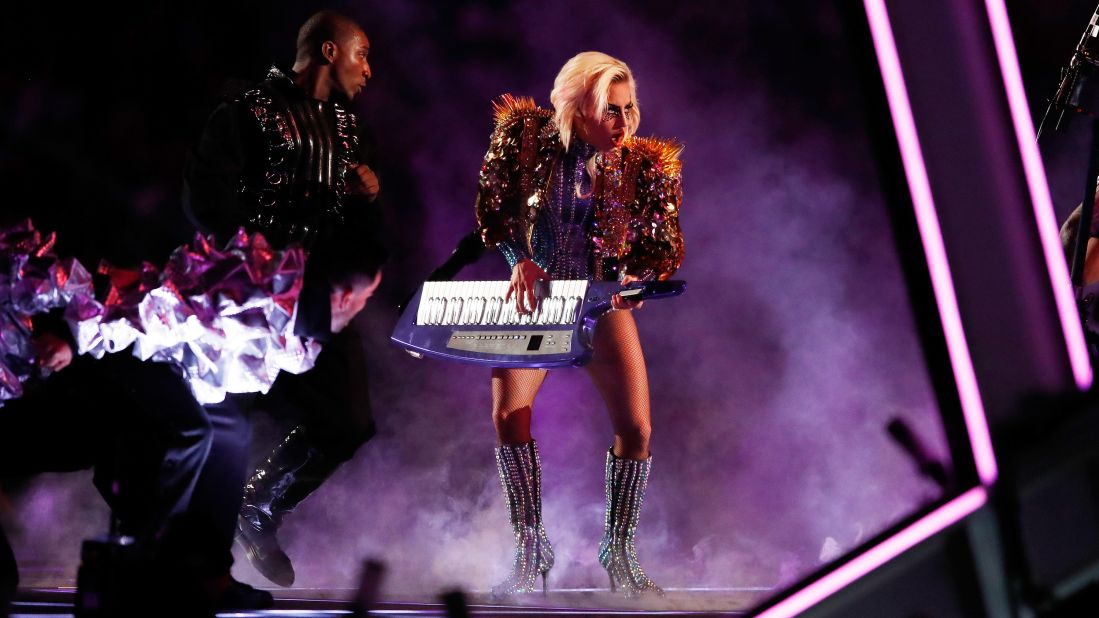 Gaga plays the keytar.
