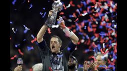 New England Patriots' Tom Brady raises the Vince Lombardi Trophy after defeating the Atlanta Falcons in overtime at the NFL Super Bowl 51 football game Sunday, Feb. 5, 2017, in Houston. The Patriots defeated the Falcons 34-28. (AP Photo/Darron Cummings)