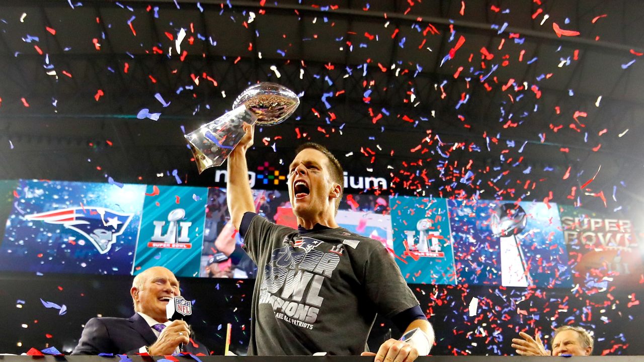 HOUSTON, TX - FEBRUARY 05: Tom Brady #12 of the New England Patriots celebrates with the Vince Lombardi Trophy after defeating the Atlanta Falcons during Super Bowl 51 at NRG Stadium on February 5, 2017 in Houston, Texas. The Patriots defeated the Falcons 34-28. (Photo by Kevin C. Cox/Getty Images)