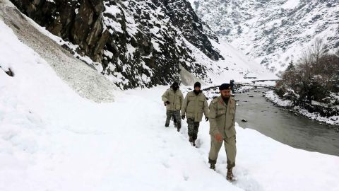 Scouts try to reach the areas in Chitral, Pakistan, affected by the avalanche.
