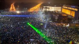 TOPSHOT - This picture shows a large view of people protesting against the Romanian government's contentious corruption decree in front of the government headquarters at the Victoriei square in Bucharest on February 5, 2017.
Romania's government formally repealed contentious corruption legislation that has sparked the biggest protests since the fall of dictator Nicolae Ceausescu in 1989, ministerial sources said. The emergency decree, announced on Tuesday (January 31, 2017), would have decriminalised certain corruption offences, raising concerns in Romania and outside that the government was easing up on fighting graft. Centre-right President Klaus Iohannis, elected in 2014 on an anti-graft platform, previously had called the decree "scandalous" and moved to invoke the constitutional court. / AFP / ANDREI PUNGOVSCHI        (Photo credit should read ANDREI PUNGOVSCHI/AFP/Getty Images)