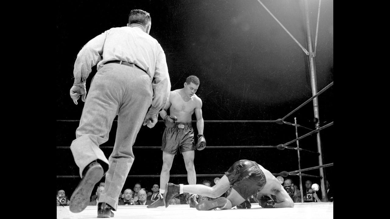 The Billy Conn-Joe Louis rivalry is one of the greatest in boxing, in no small part due to their 1941 fisticuffs. Through 12 rounds, Conn had the edge on the scorecards -- 7-5, 7-4, 6-6. Louis' trainer, Jack Blackburn, worried that Conn could win by decision, told the "Brown Bomber" he had to knock Conn out. And so he did. With 2:58 left in the 13th round, Louis put Conn on the mat to secure his 18th defense of the world heavyweight title.