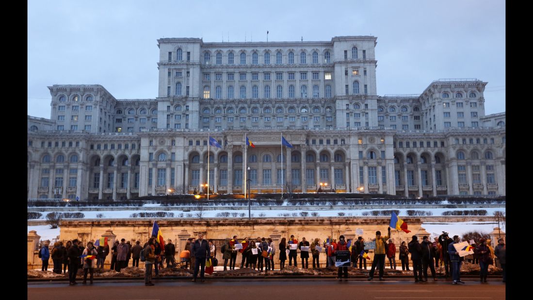 Protesters gather in front of a government building on Saturday, February 4. In a nationally televised address Saturday evening, Prime Minister Grindeanu told Romanians, "Romania cannot be torn apart."