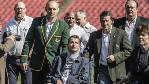 Van der Westhuizen (C), during a re-enactment of the team photo from the 1995 Rugby World Cup final.