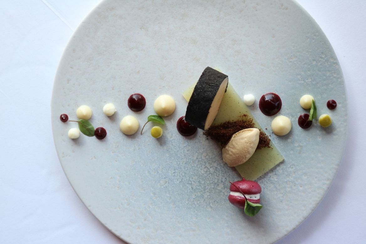 "At.mosphere is excellent. They serve a really impressive menu, and their Japanese scallops with vadouvan, cauliflower, raisins and almonds is presented beautifully. The foie gras, apple, beetroot, apple and vanilla dish is absolutely stunning, too."