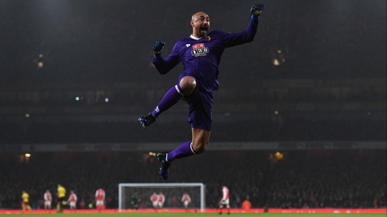 Watford goalkeeper Heurelho Gomes celebrates his team's second goal during its 2-1 upset of Arsenal on Tuesday, January 31. The Premier League match was played in London.