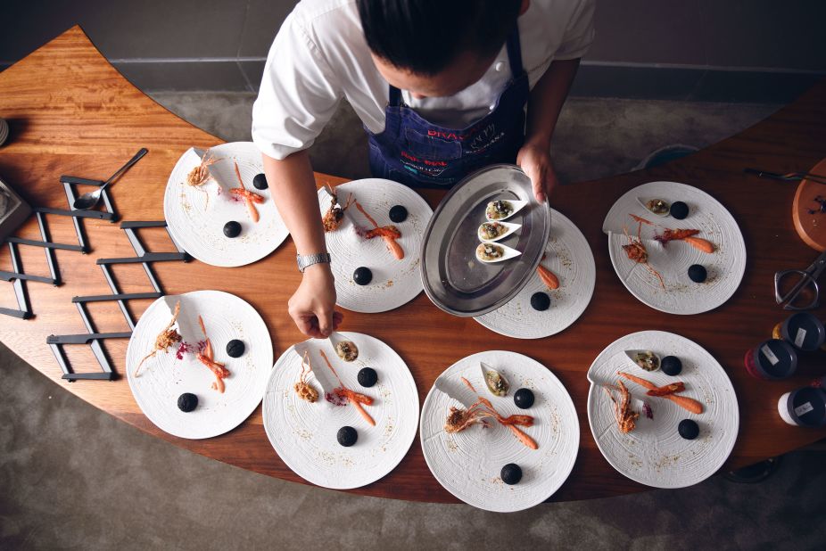 "Singaporean chef Reif has taken the traditional chef's table to another level by creating a private 'apartment' one floor above his restaurant Play in the H Hotel, where he personally cooks and serves up to 12 guests, any day and night of the week," says Wood.