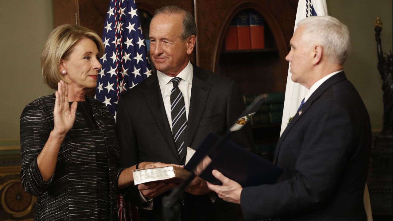 Pence swears in Education Secretary Betsy DeVos next to her husband, Dick, on Tuesday, February 7. Pence <a href="http://www.cnn.com/2017/02/07/politics/betsy-devos-senate-vote/" target="_blank">cast a historic tie-breaking vote</a> to confirm DeVos after the Senate was divided 50-50.