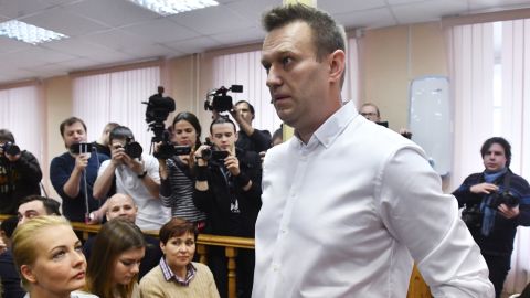 Politician Alexei Navalny, center, waits for Friday's court hearing in Kirov.