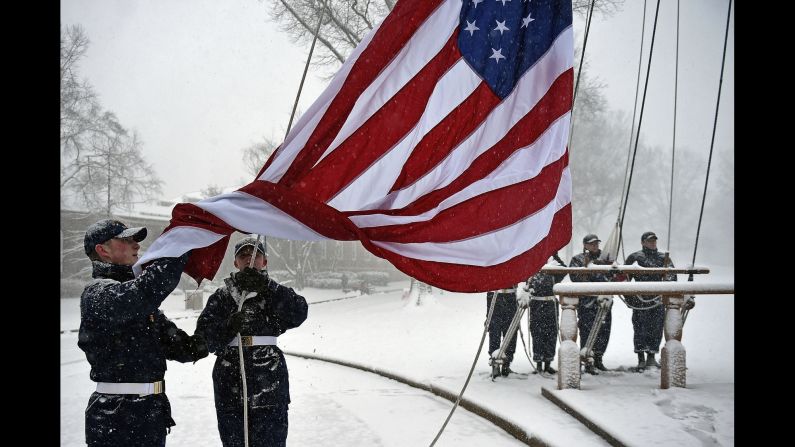 The American flag is raised at the US Coast Guard Academy in New London, Connecticut, on February 9.