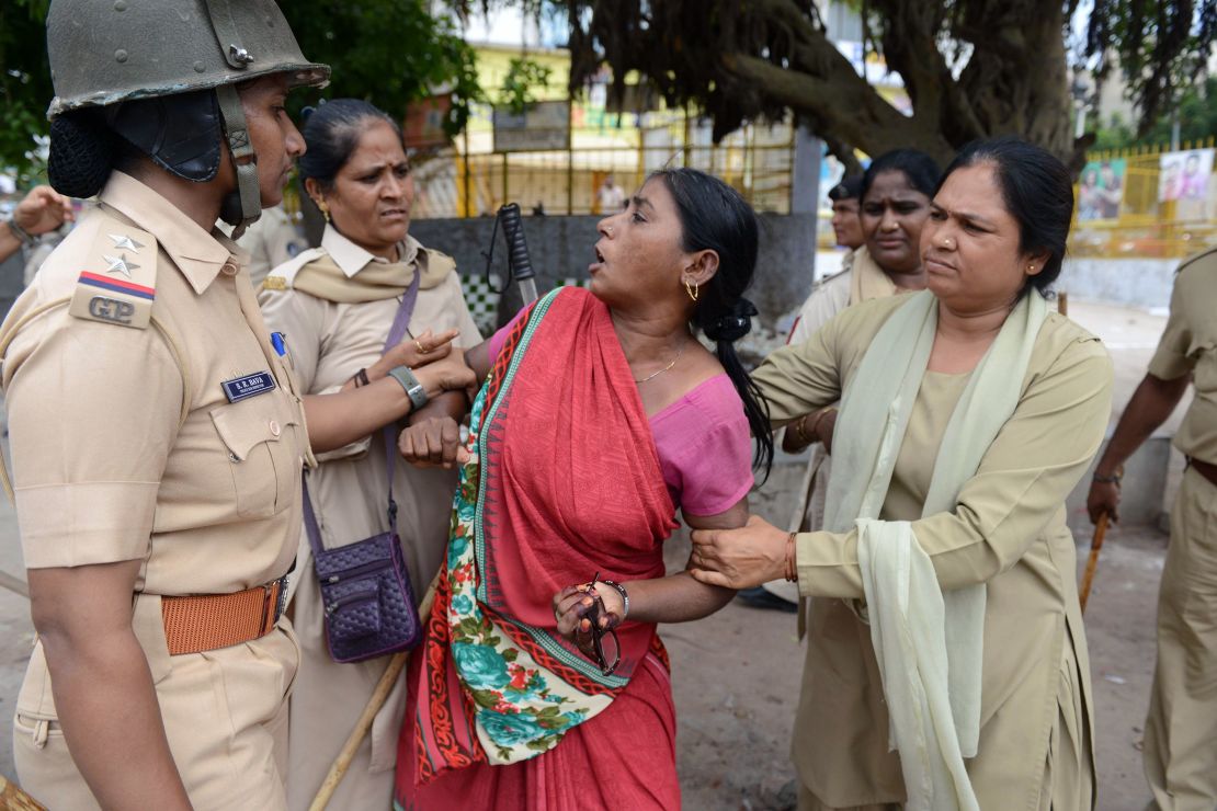 A member of the Dalit caste community is detained during a protest against an earlier attack on Dalits in July, 2016.