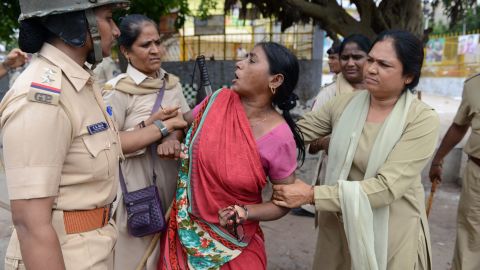 A member of the Dalit caste community is detained during a protest against an earlier attack on Dalits in July, 2016.