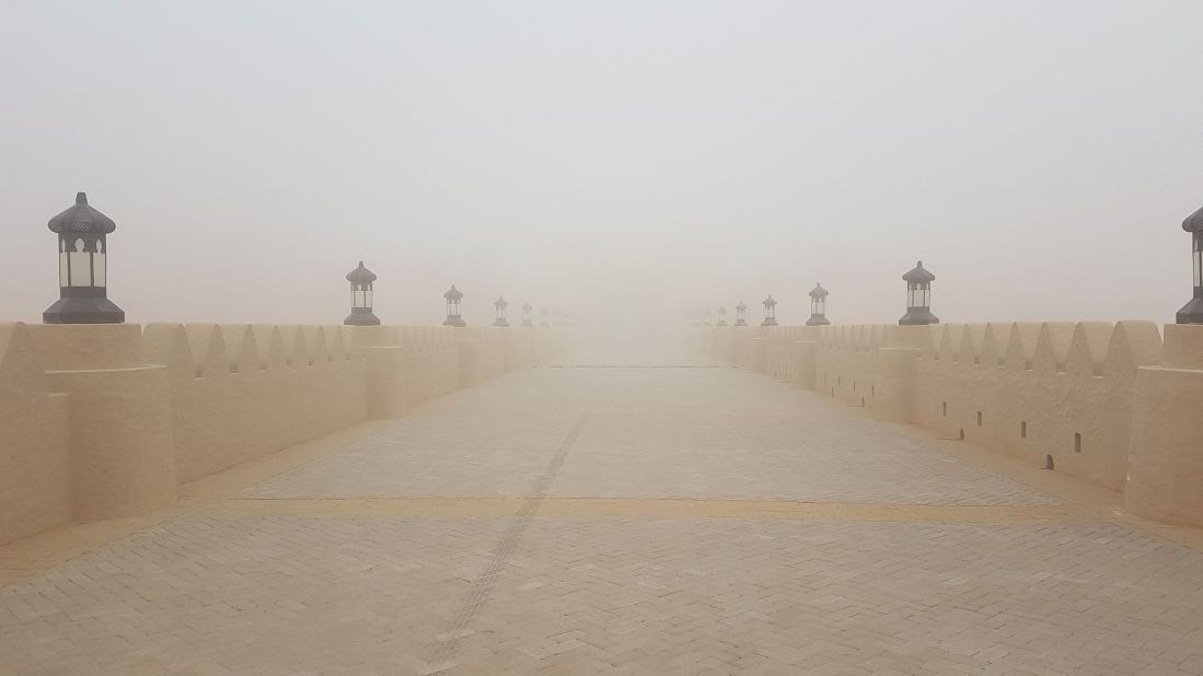 <strong>Desert fog:</strong> The sun doesn't always beat down on the Qasr Al Sarab. In winter, mornings can be foggy, adding an eerie atmosphere to the silent desert. It doesn't stick around long. The sun soon burns off the cloud. 