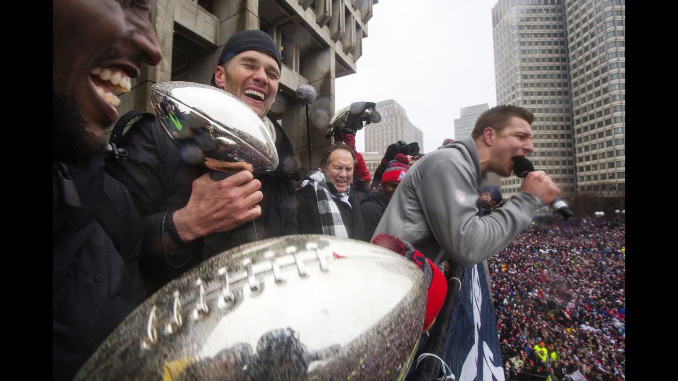 New England Patriots tight end Rob Gronkowski speaks to the crowd at the football team's <a href="http://www.cnn.com/2017/02/05/sport/gallery/super-bowl-li/index.html" target="_blank">Super Bowl</a> victory parade in Boston on Tuesday, February 7. Behind Gronkowski are quarterback Tom Brady and head coach Bill Belichick, who won their record fifth Super Bowls with the Patriots. <a href="http://www.cnn.com/2015/01/25/us/gallery/super-bowl-superlatives/index.html" target="_blank">See more Super Bowl records</a>