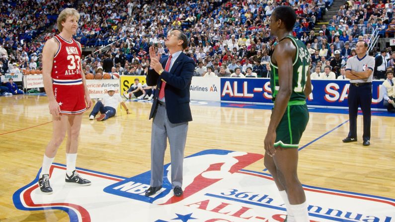 Larry Bird, left, and Craig Hodges await the outcome of a coin toss at the NBA's first 3-point shooting contest in 1986. The contest is held every year on All-Star Weekend, and the best shooters in the league compete for the title. Bird and Hodges have each won three, which is more than anyone else.
