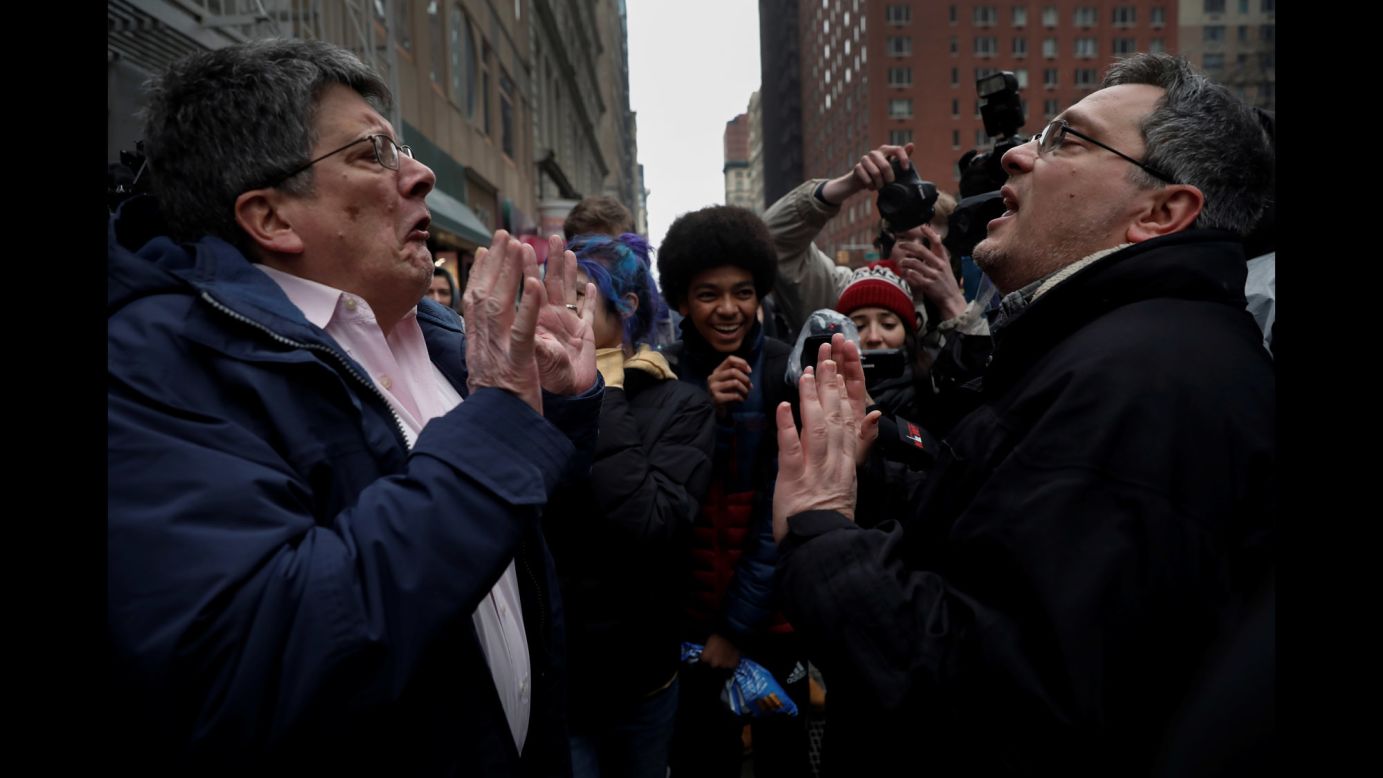 A demonstrator in New York, left, argues with a supporter of US President Donald Trump during a protest against Trump's immigration policies on Tuesday, February 7. Trump <a href="http://www.cnn.com/2017/02/06/politics/trump-travel-ban-update/" target="_blank">signed an executive order</a> that would temporarily suspend the admission of refugees and bar entry to the United States from seven Muslim-majority countries.