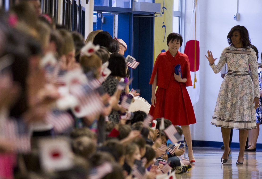 Then-First Lady  Michelle Obama and  Akie Abe meet students during a tour of the Great Falls Elementary School in Great Falls, Virginia on April 28, 2015. 